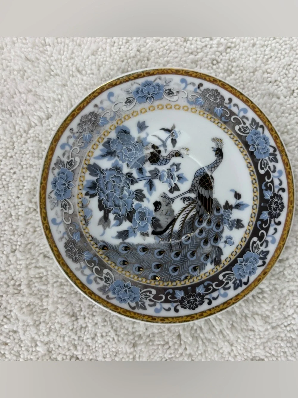 Vintage Porcelain Plate Featuring Blue and White Peacocks with Peony Motifs